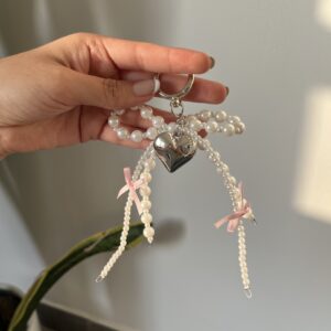 Charm lazo con perlas